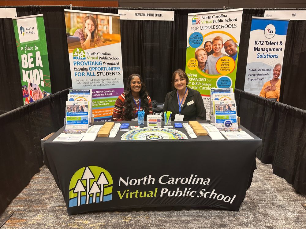 Dr. Lashaundon Perkins and Amber Parker at the NCASA conference booth.