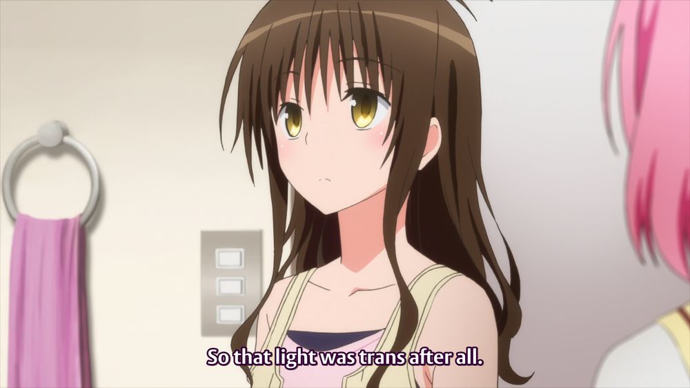 Screencap from the anime To Love Ru Darkness 2nd. The subtitles read "So the light was trans after all."