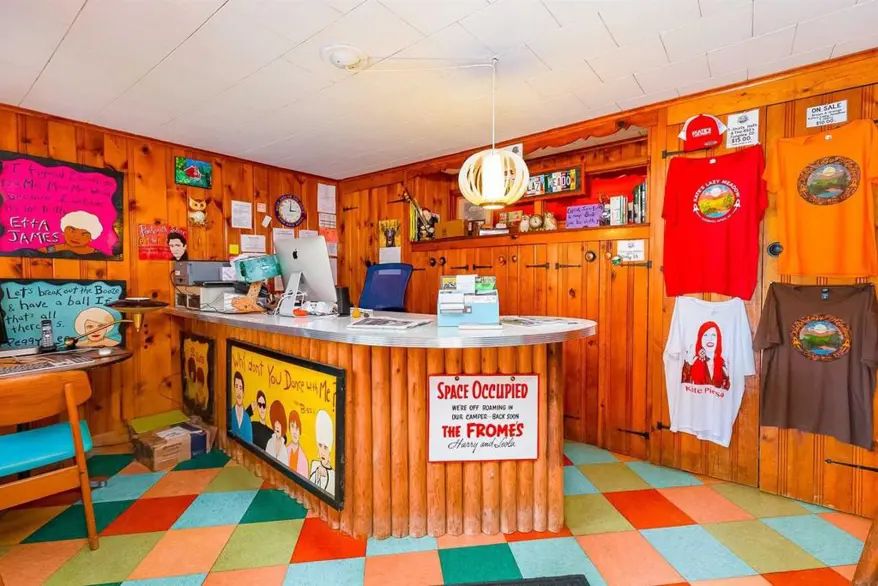Wood-panelled bar, including art of B-52s, Peggy Lee and Etta James