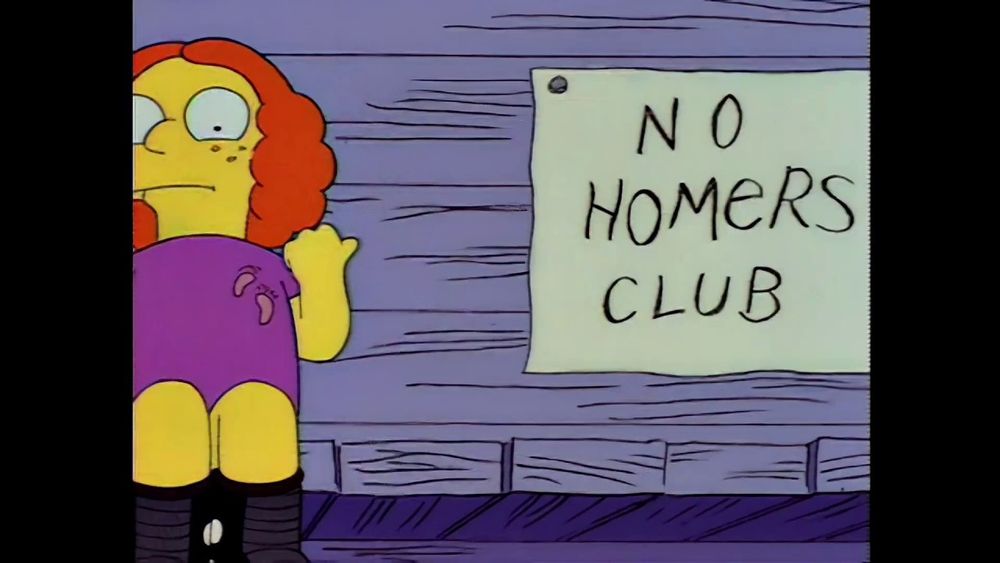 A still from The Simpsons. A girl sits next to a sign saying NO HOMERS CLUB.