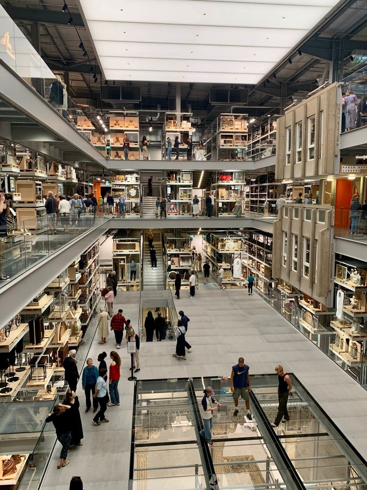 A view of the new V&A storehouse with exhibits arranged on shelves around a courtyard