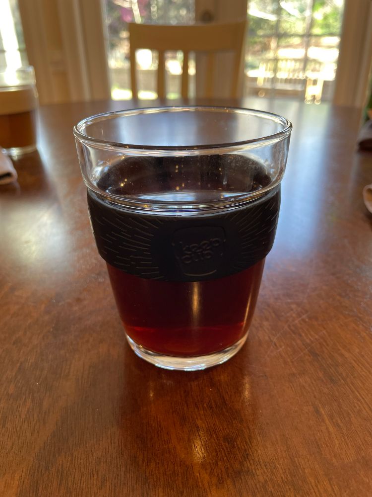 Drip coffee inside a black KeepCup
