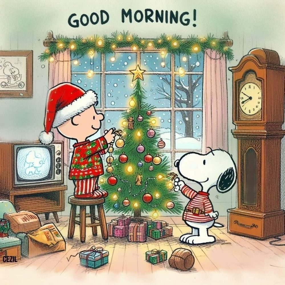 Charlie Brown in a Santa Hate and PJs and Snoopy in a candy cane striped sweater decorating their Christmas tree. Good Morning text above the tree