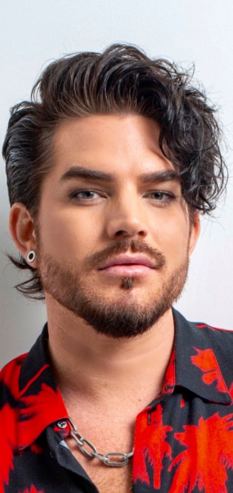 Adam Lambert circa 2019, looking at the camera
