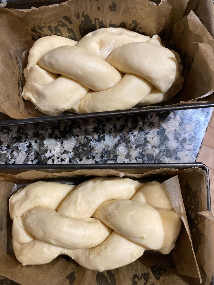 Uncooked braided brioche buns