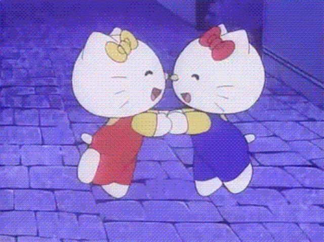 two hello kitty cartoon characters are dancing on a brick sidewalk .