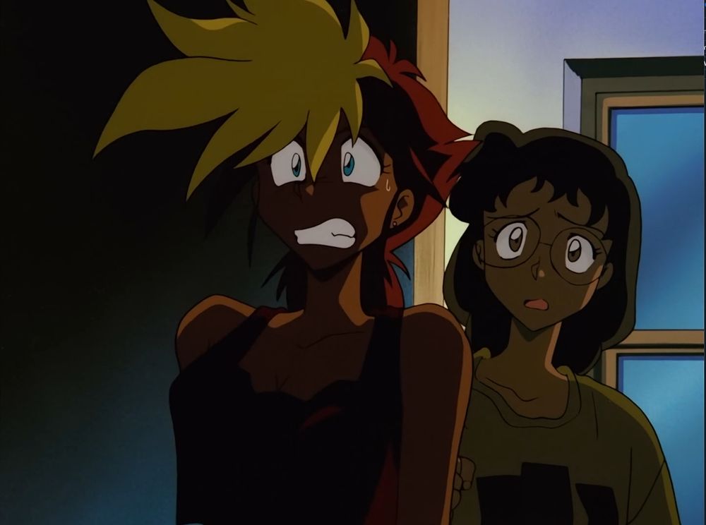 Kei looks shocked while Read or Die looks on behind her