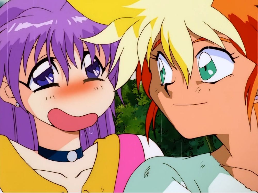 Yuri, blissed out, while Kei looks on approvingly