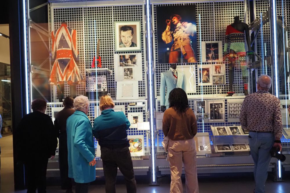Inside the David Bowie centre, looking inside the glass cases