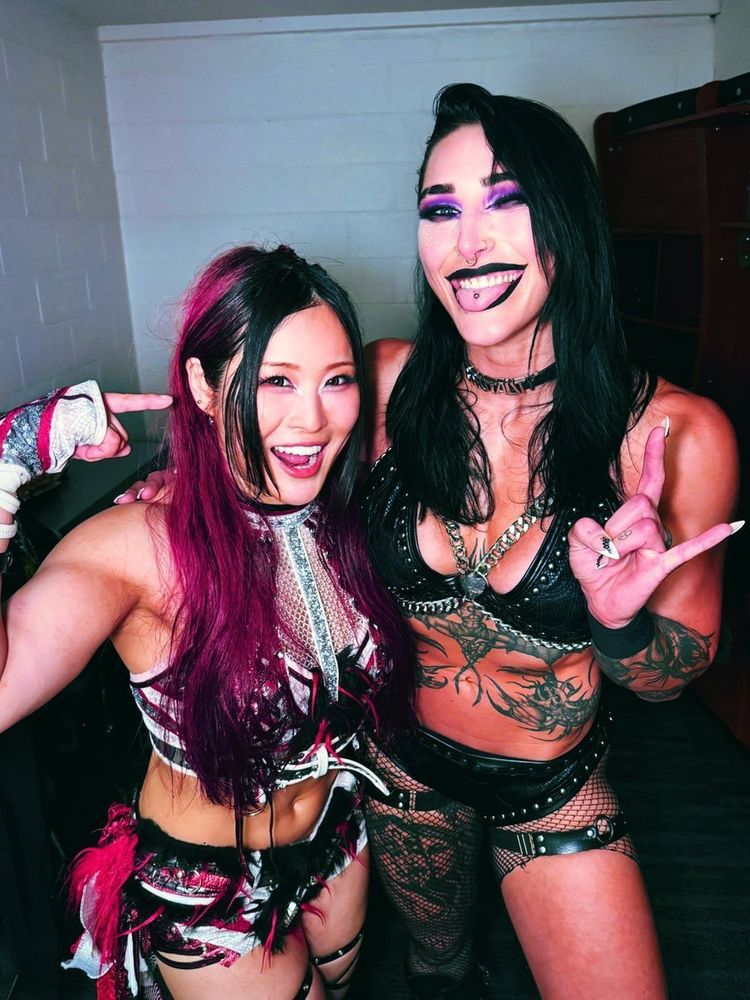 Iyo Sky and Rhea Ripley 