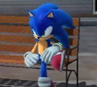 sonic sitting politely on a bench