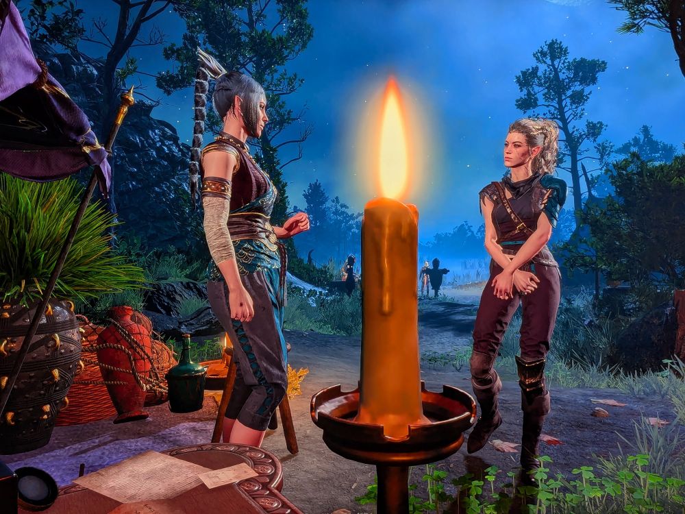 Shadowheart and Sorena (Tav) stand across from each other in the act 1 camp at night, with a candle in between them