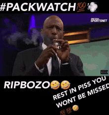 An image of James Worthy smoking a cigar with the caption "#PACKWATCH RIPBOZO REST IN PISS YOU WON'T BE MISSED"