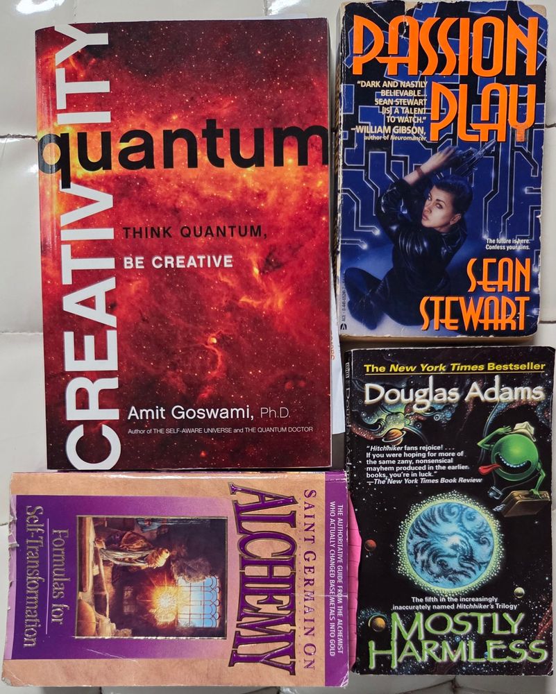 Four books purloined from an internally-communal bookcase: QUANTUM CREATIVITY by Amit Goswami, PASSION PLAY by Sean Stewart, SAINT GERMAIN ON ALCHEMY: FORMULAS FOR SELF-TRANSFORMATION, and MOST HARMLESS by Douglas Adams