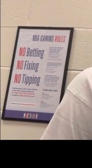 Zoom in on the poster. It says "no betting no fixing no tipping" and some other text too small to read