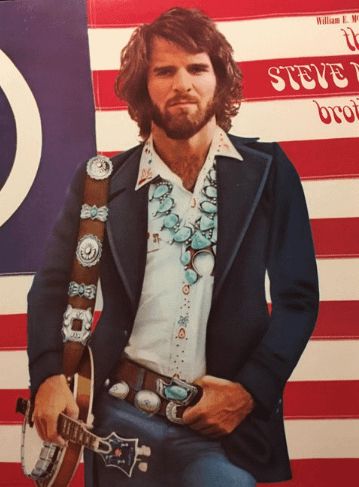 Steve Martin, bearded and bedecked in turquoise on the rear cover of his bluegrass album The Steve Martin Brothers, 1981.
