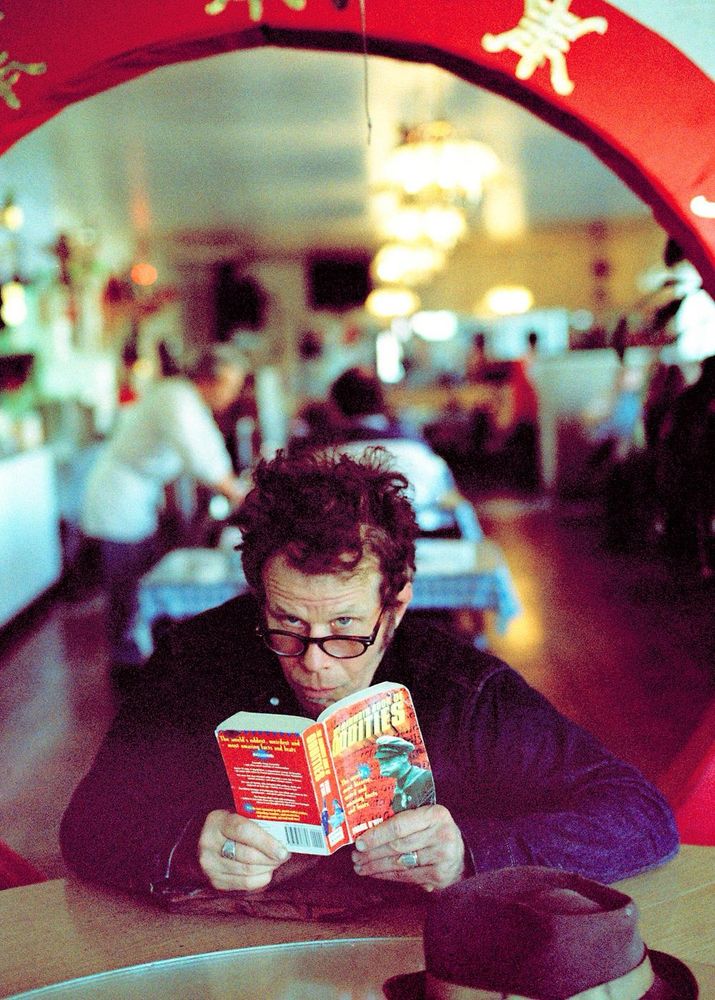 Tom Waits reading 'The Mammoth Book of Oddities' at the China Light Restaurant © Jill Furmanovsky