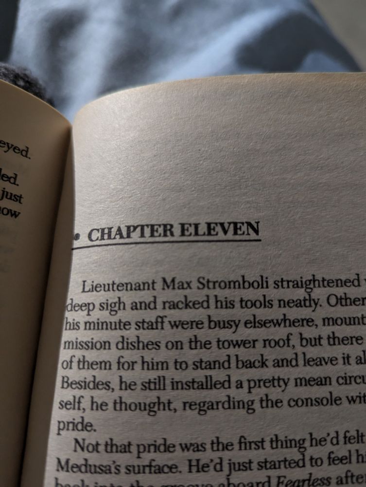 A picture of a book page that starts with the line "Lieutenant Max Stromboli straightened his tie"