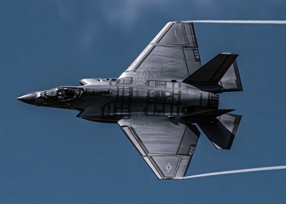 One of America’s most advanced stealth fighters, the F-35A Lightning II, slices through the skies with precision and power. Captured here mid-turn, showing off its sleek lines, cutting-edge design, and vapor trails that tell the story of speed and maneuverability.
