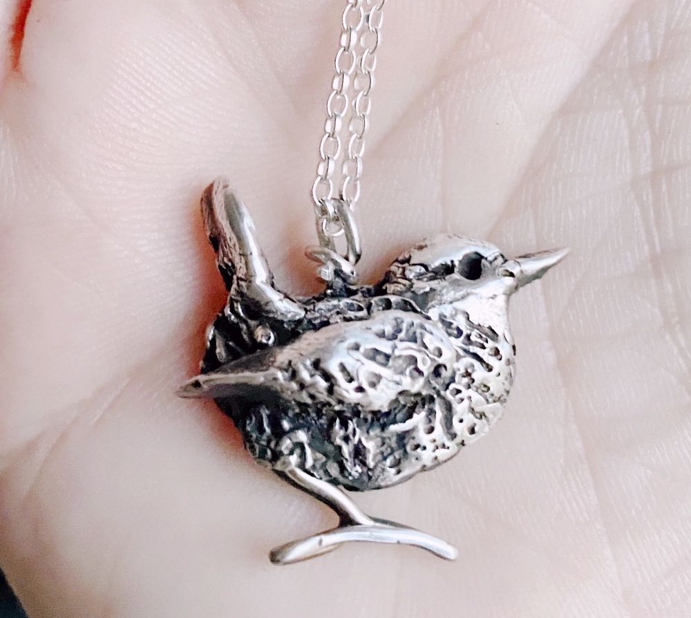 My wren necklace, individually handmade like all my jewellery designs, made by sculpting a tiny wren in recycled silver