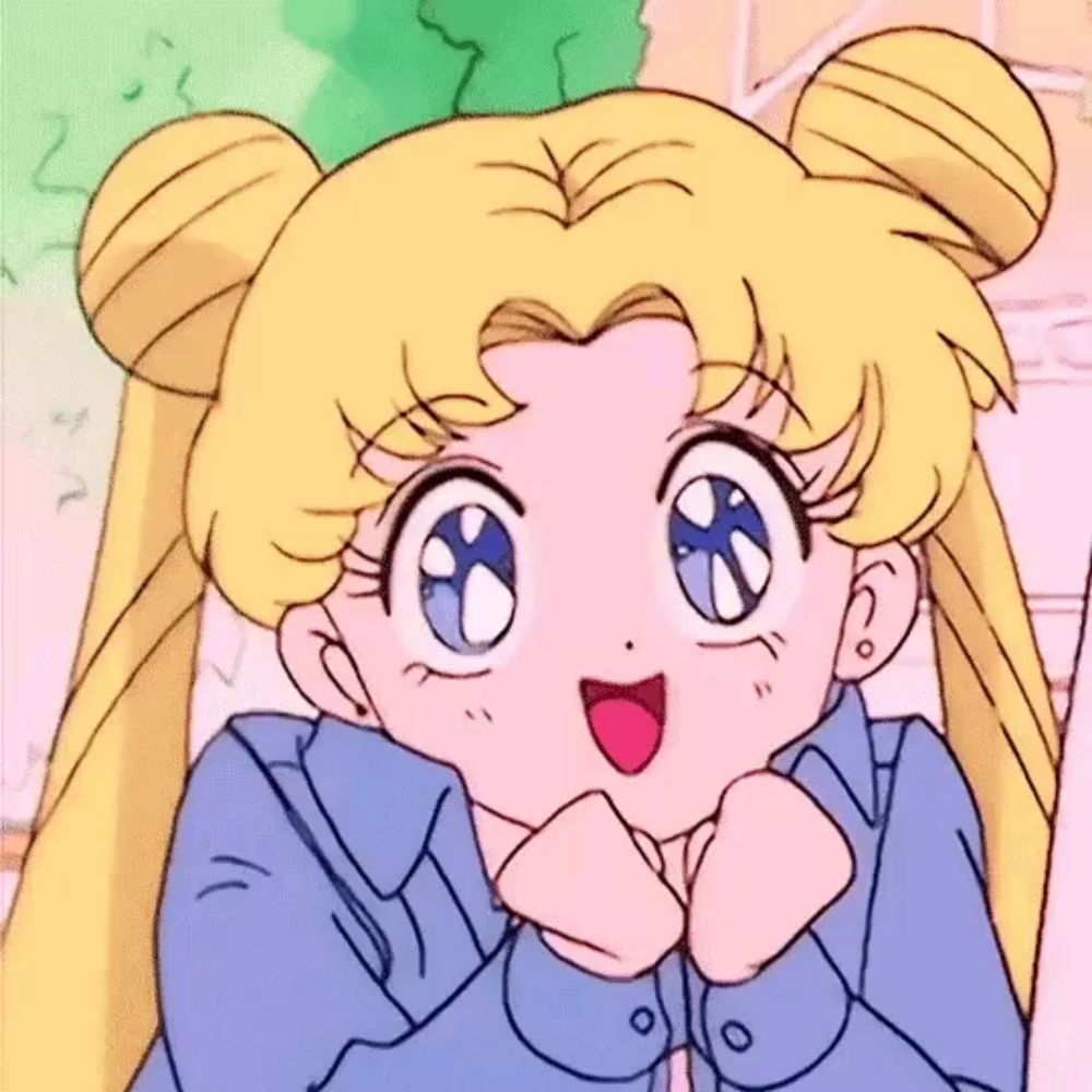 a close up of a cartoon girl with blonde hair and blue eyes