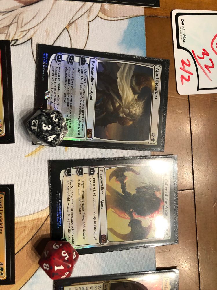 Ajani steadfast that kept me alive with giving creatures lifelink and my ajani caller of the pride at 1 loyalty after ultimating and giving me 32 cat tokens