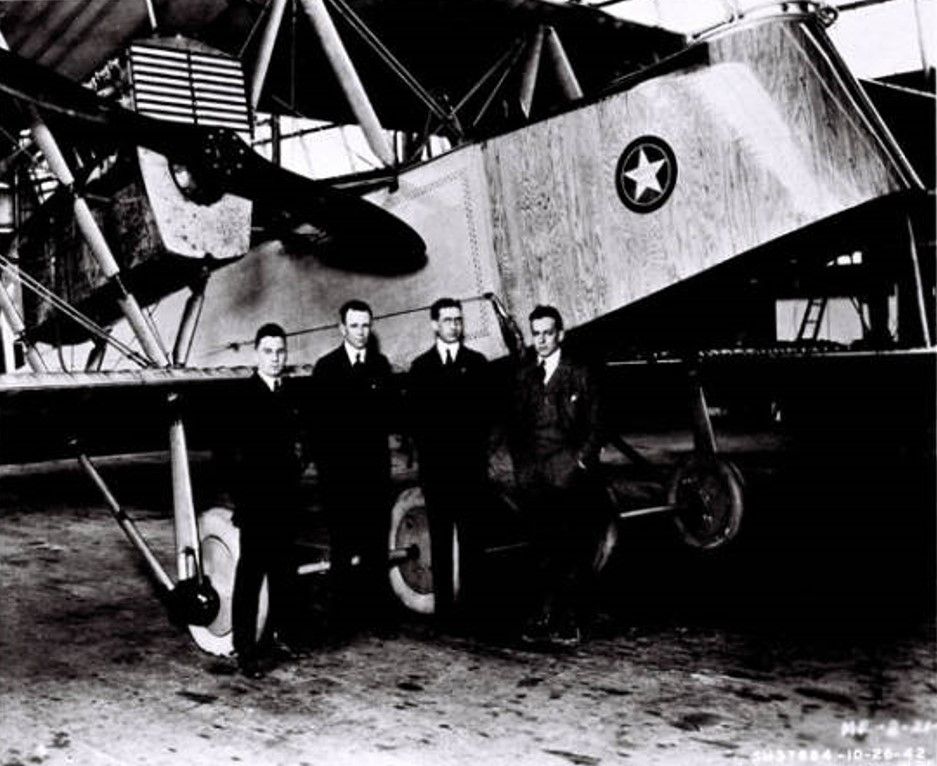 Left to Right: Larry Bell, Eric Springer, Glenn Martin, Donald Douglas, in front of a large wooden biplane Martin Bomber at the company factor in Cleveland in the 1920s.  Springer was the only one of the bunch who wouldn't go on to have an aircraft company and famous airplanes named after him.