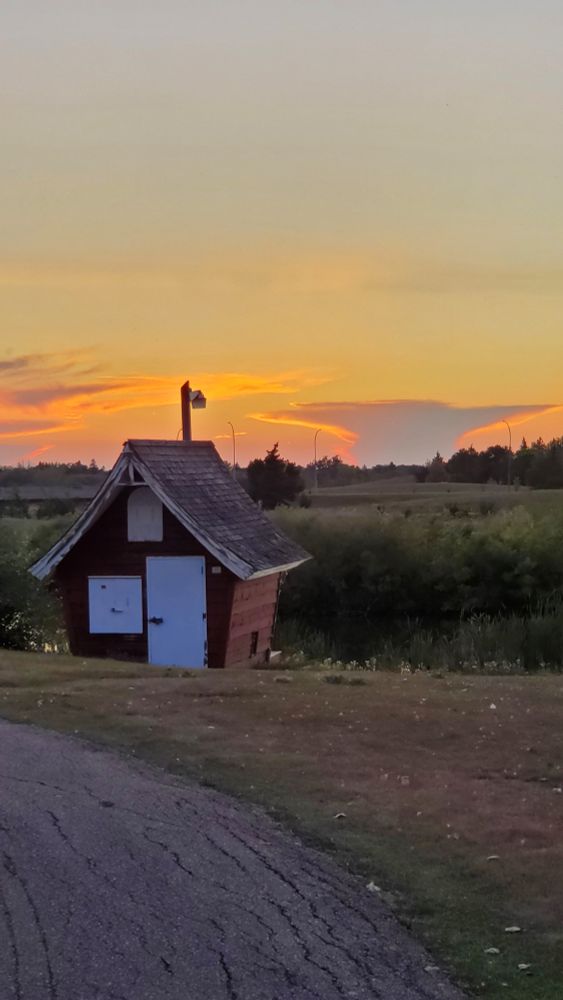 Odd shed with odd cloud
