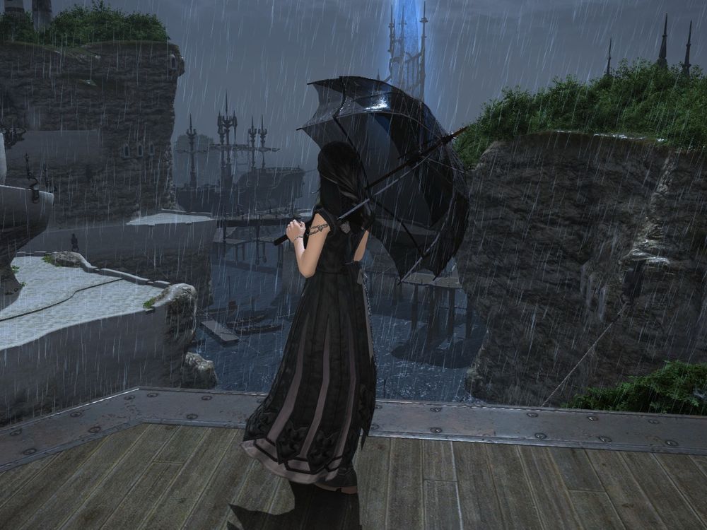 Grimmlei gpose - Grimmlei standing with an umbrella staring off into the far distance in the rain. 