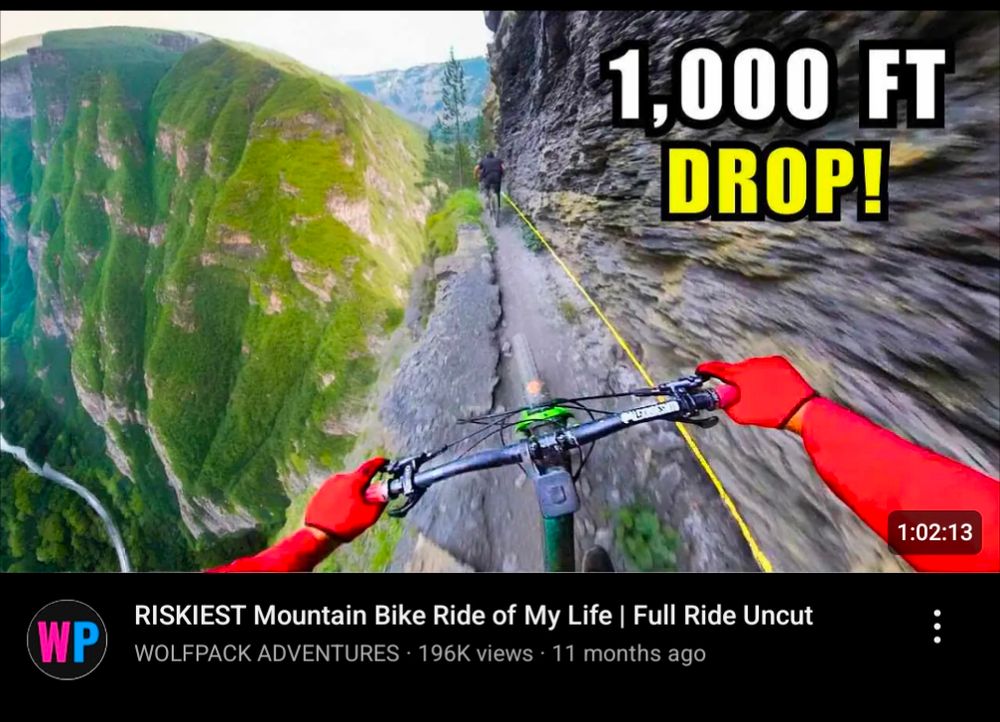 screenshot of a youtube video by wolfpack adventures, it's titled "riskiest mountain bike ride of my life full ride uncut"