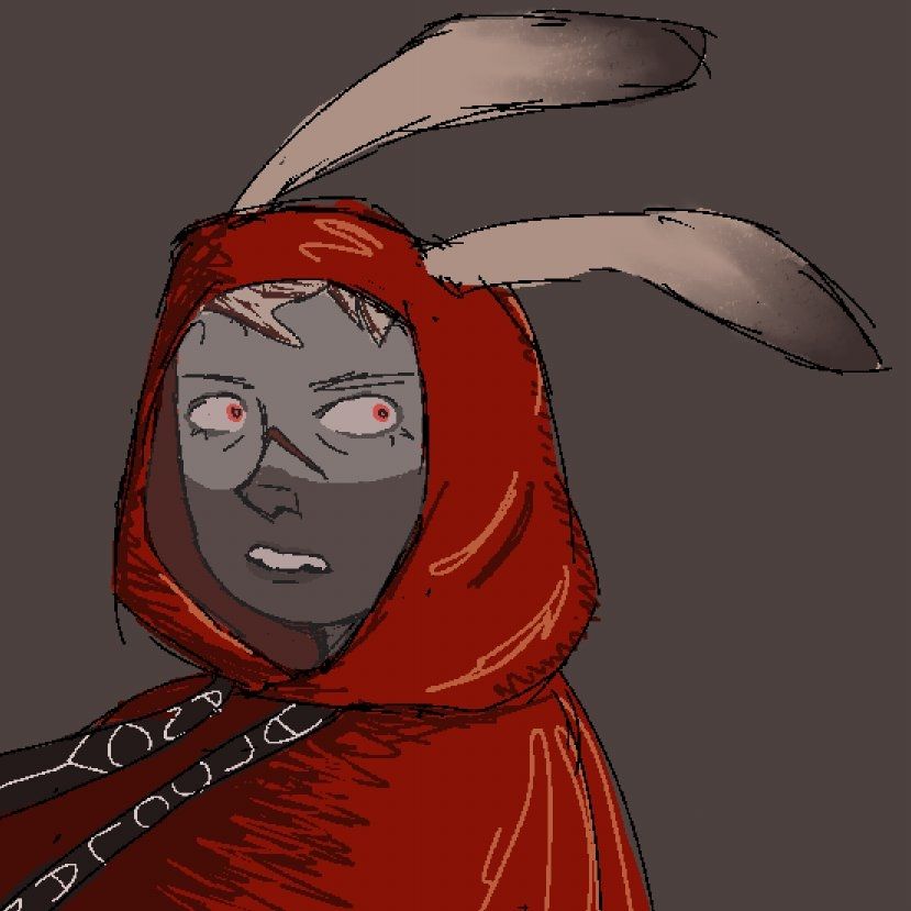 Clancy in a bishop's robe with blonde hair and rabbit ears sticking out of his cloak