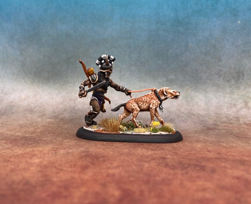 Greek warrior loping along with a hyena on a lead.