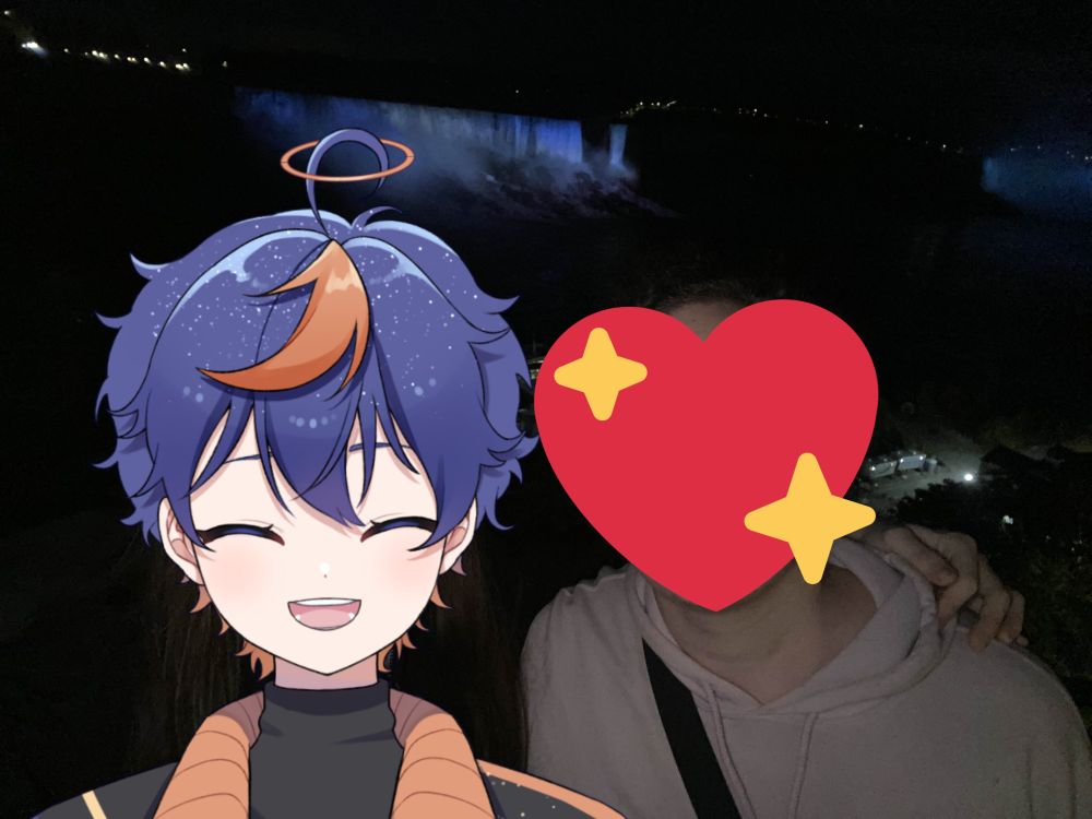 twi and his friend posing infront of niagara falls