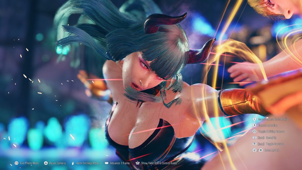 Side photo of Lili in the Morrigan cosplay attacking.