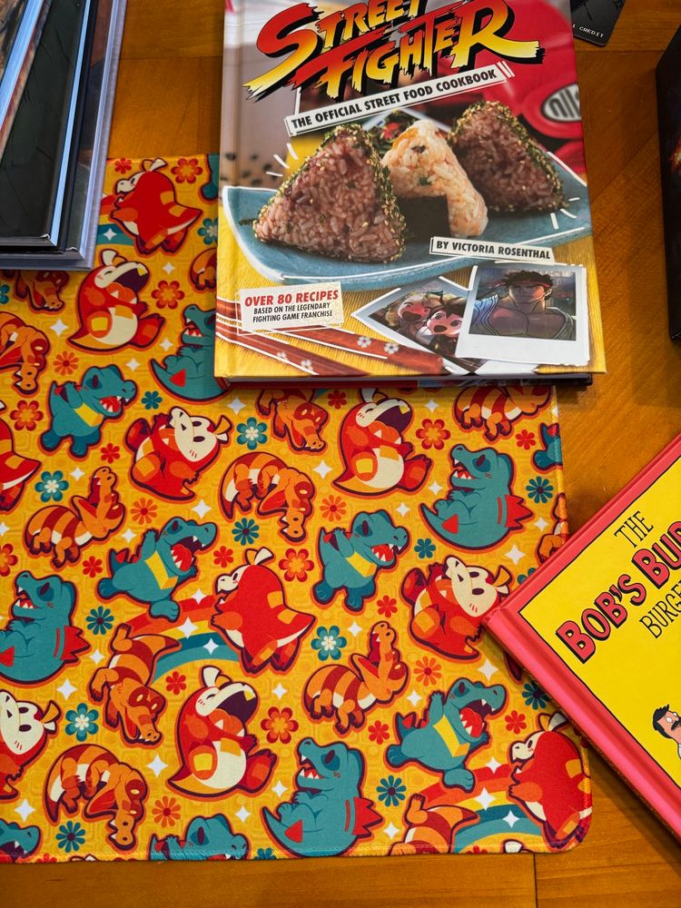 A better picture of the Totodile, Fuecoco, and Sandile playmat.