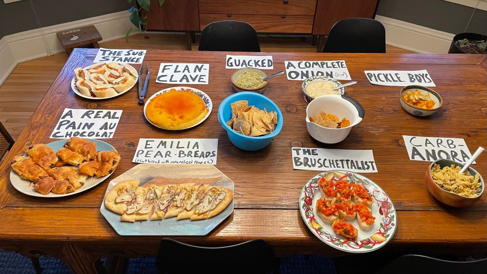 The Sub-stance (party sub)
Flan-clave (a flanked)
A Real Pain au Chocolat
Emilia Pearbreads (flatbread with caramelized pears, Gorgonzola, and arugula)
Guac-ked (wicked-themed guacamole)
A Complete Onion dip
The Bruschettalist
Pickle Boys
Carb-Anora 