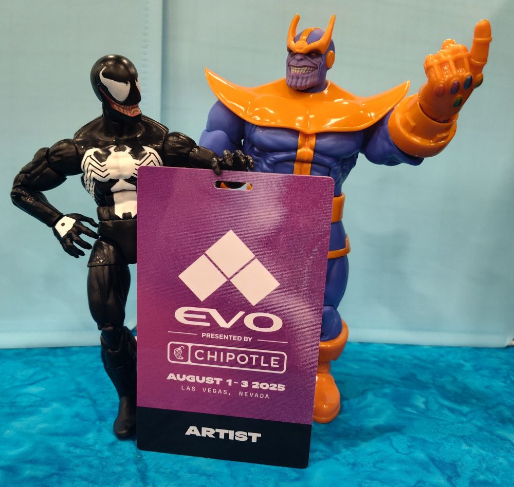 Venom and Thanos figured posed behind an evo artist badge