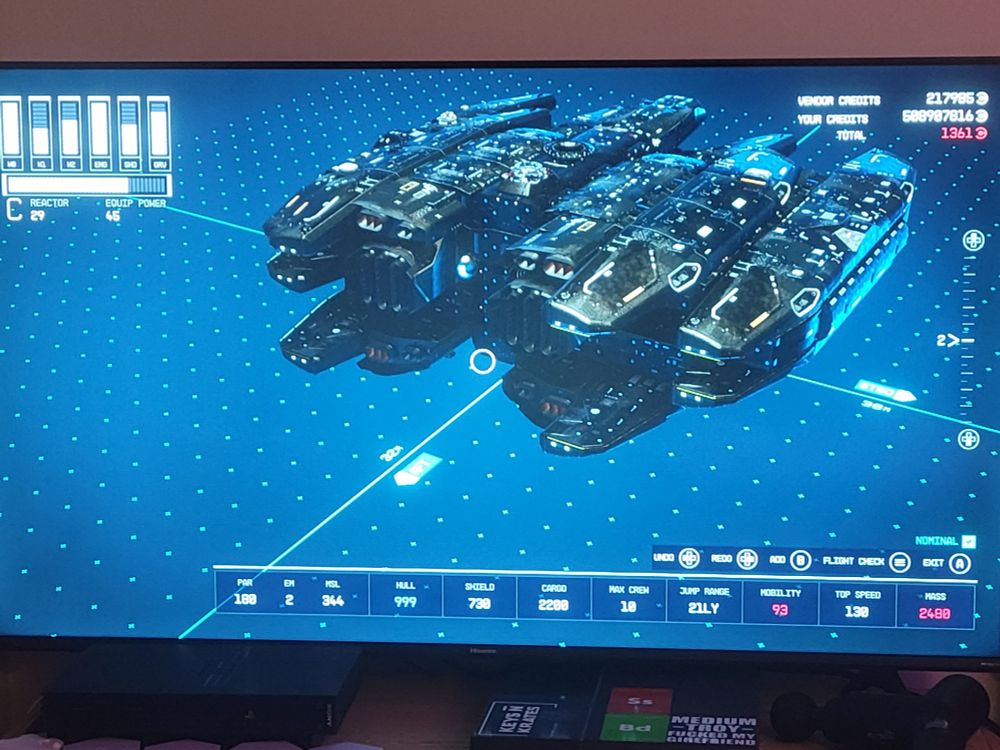 A screenshot of my starship in starfield, a big black beast of a ship, viewed from the back.