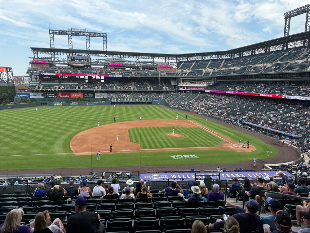 A view of the field at Coors Field during a Rockies versus Blue Jays game