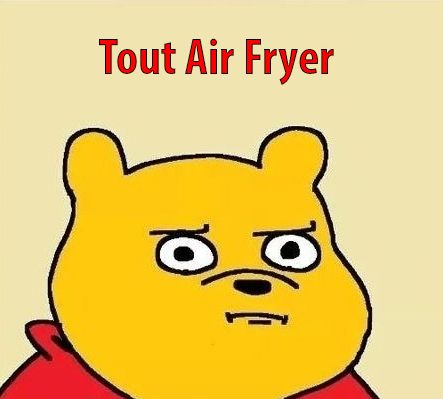 Tête de winnie l'ourson pas content avec le texte "tout air fryer" en rouge au dessus