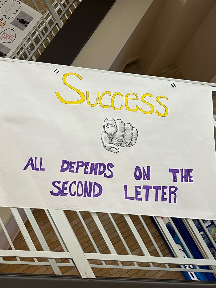 “Success all depends on the second letter” with a picture of a finger pointing at the viewer