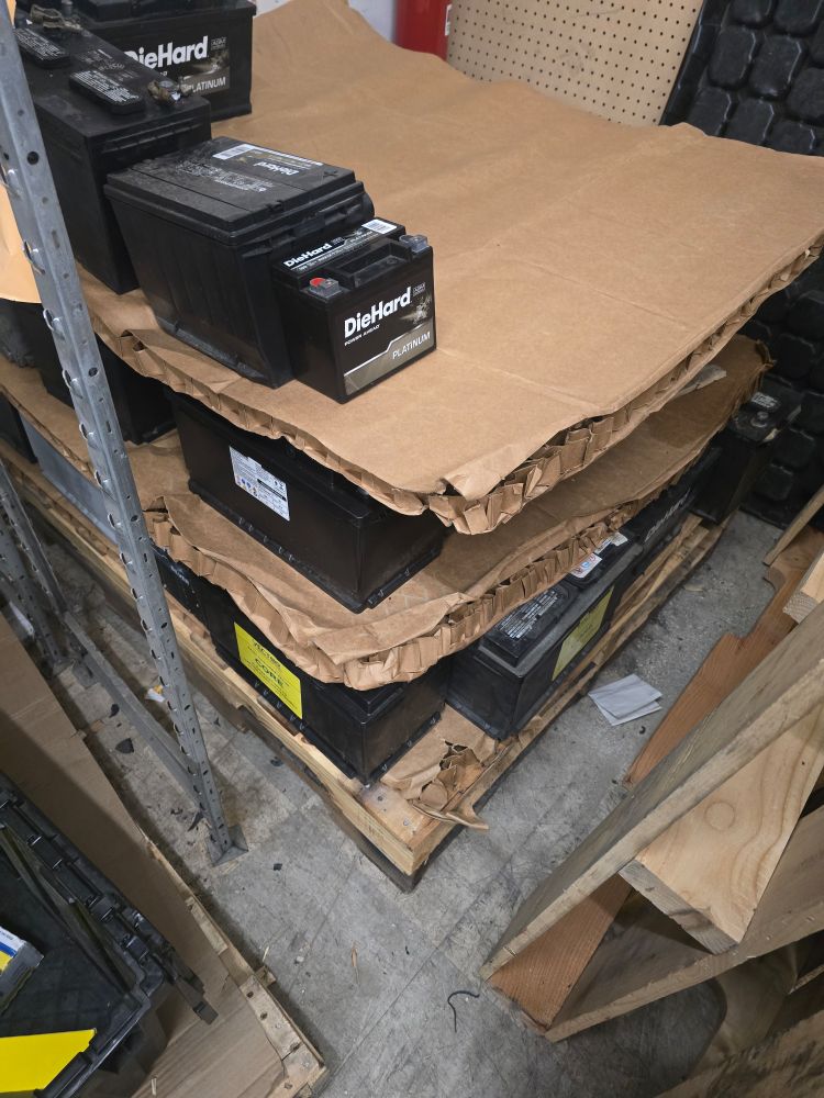 Car batteries improperly stacked too high