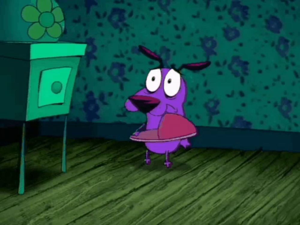 a cartoon of courage the cowardly dog holding a purple object