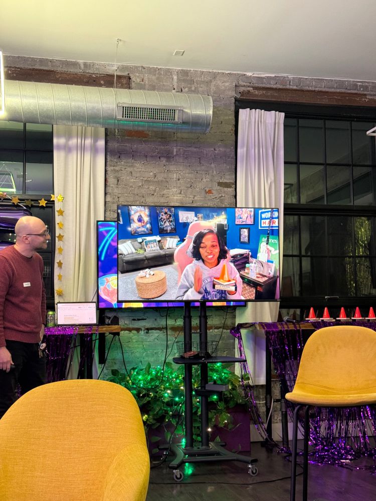 A person accepting an award on a TV