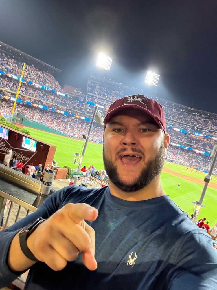 A generic white man pointing at the camera