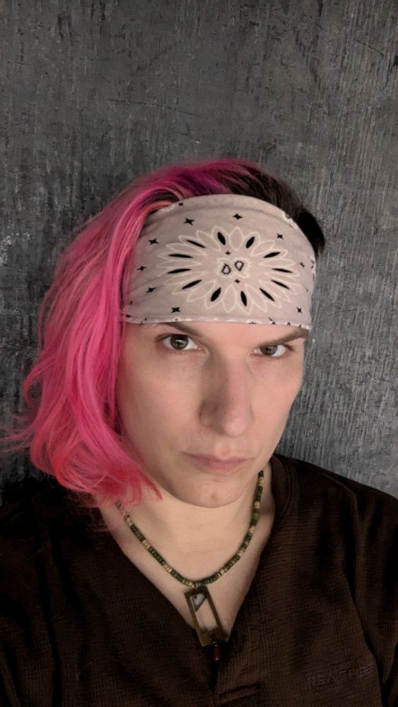 Photo of a trans woman in her late 30's.