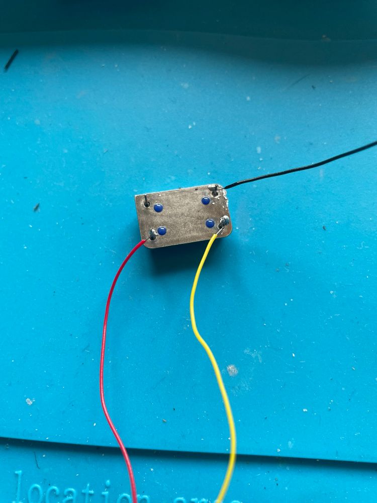 Active oscillator crystal with attached wires 