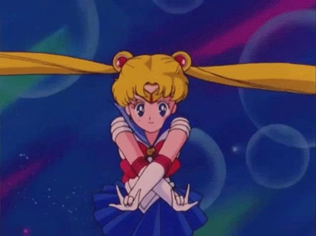 sailor moon is standing in front of the moon