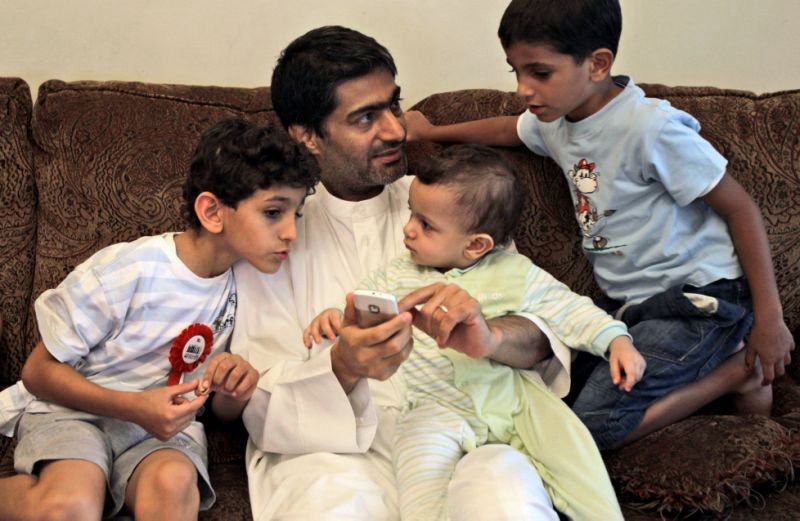 Ahmed Mansoor with three of his children 