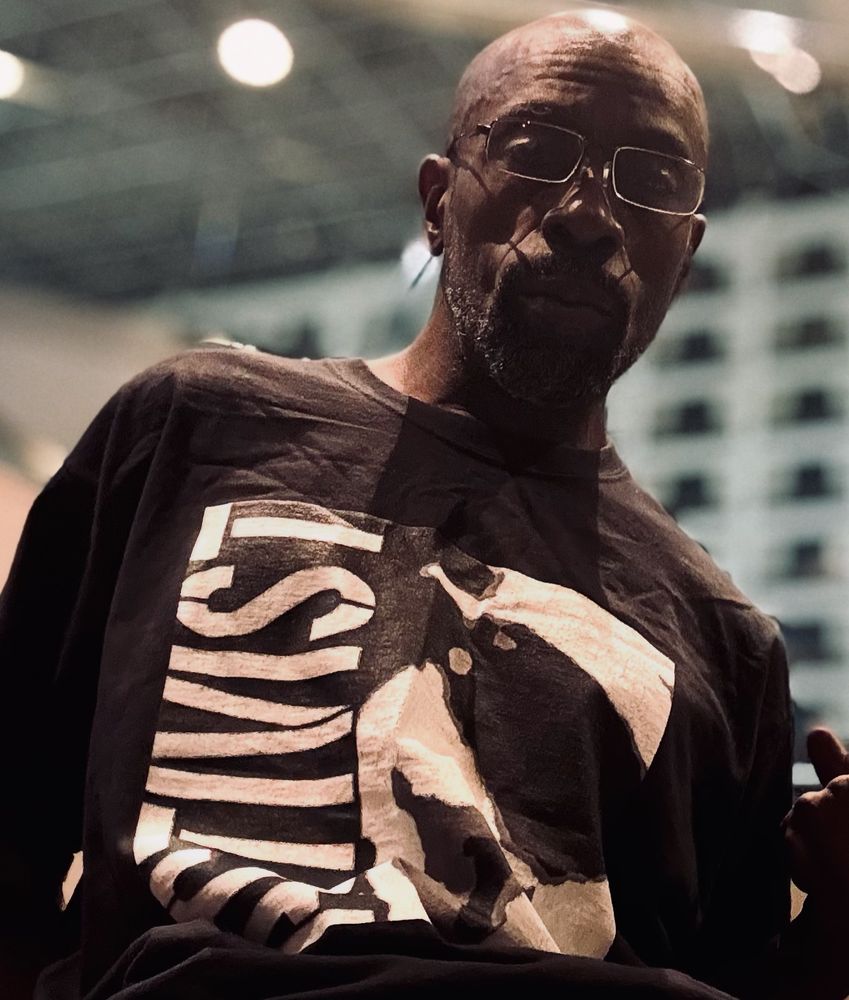 [image of a Black man wearing glasses seated in a airport lobby looking into the camera]

Second trip.. opposite coasts .. same reaction to my humanity.. at least this time they offered $10 .. instead of $1 … 

There are days that I find a wellspring of patience I didn’t know I had.. and it’s running out.. 

#DaSoulToucha 